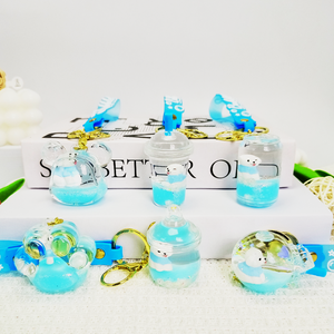 พวงกุญแจอะคริลิคทรงต่างๆ น้ำหนักเบา พิมพ์ลาย UV ทรายเหลวสีฟ้า ประดับกลิตเตอร์รูปสุนัขสุดน่ารัก ของตกแต่งรูปสัตว์การ์ตูน - Product Image 1