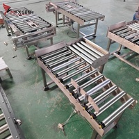 Convoyeur à rouleaux en acier inoxydable alimenté avec diamètre personnalisé et rouleau de longueur personnalisé pour ligne de production de boîtes