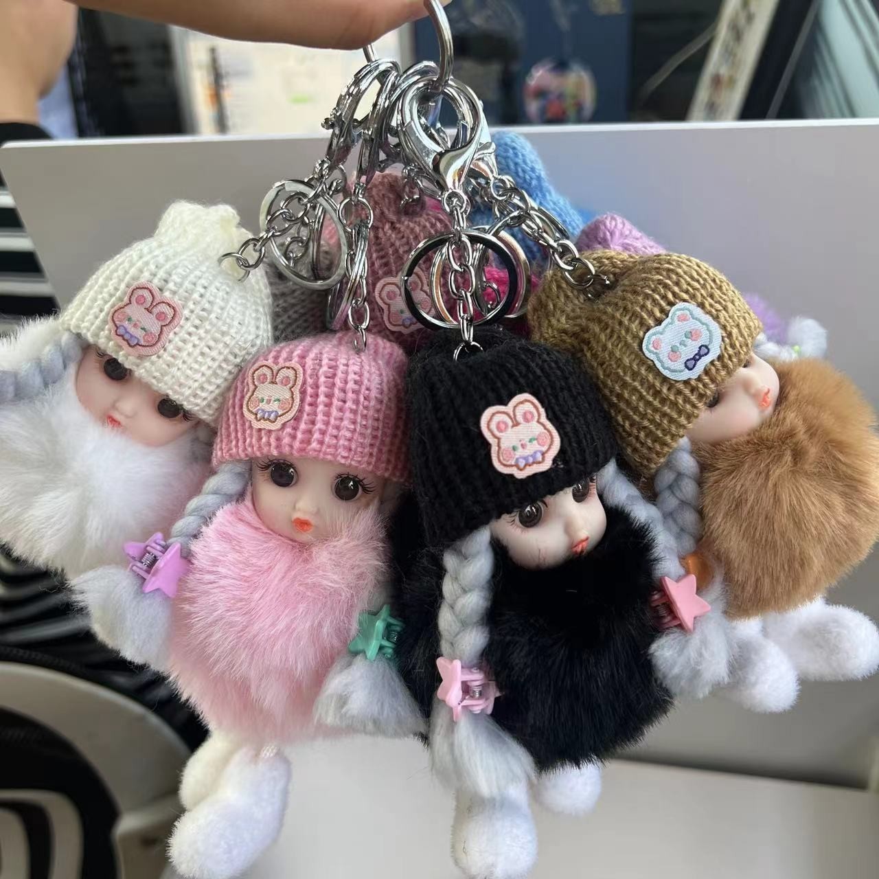 Chanel-style doll pendant