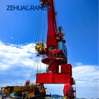 Grue portique pivotante robuste pour la manutention de marchandises en vrac et de conteneurs dans les ports, les terminaux et les chantiers navals