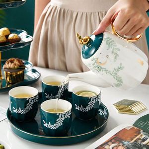 Juego de Tazas de Té de Cerámica con Diseño Rústico Rural de Hojas Verdes y Luna, 4 Tazas y 1 Tetera - Product Image 4