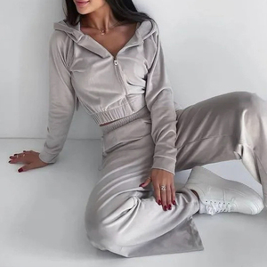 Survêtement de mode pour femmes Sweat à capuche zippé et pantalon de survêtement deux pièces en polyester coupé Ensembles de vêtements de sport pour femmes - Product Image 1