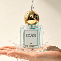 Bouteille de parfum de luxe vide en verre de 50 ml avec bouchon à bille, OEM ODM, haute qualité