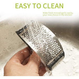 Vente chaude accessoires de cuisine outils en acier inoxydable éplucheur presse-agrumes ail hachoir gingembre poudre broyeur éplucheur ail presse - Product Image 3