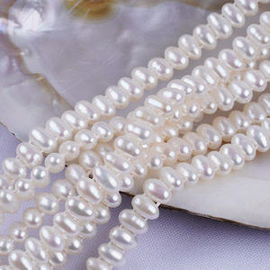 Chaîne semi-finie en perles d'eau douce naturelles blanches de 5-6 mm, forme de riz, double perforation, accessoires de style baroque, vente en gros Zhuji - Product Image 4