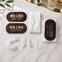 Kit de coloration capillaire professionnel jetable quatre pièces avec cape, écharpe, protège-oreilles, bonnet de douche et gants en plastique