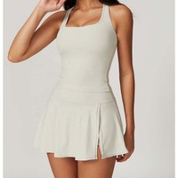 Nouvel ensemble jupe de tennis style européen et américain pour femmes avec poches, ensemble deux pièces de sport, ensemble de yoga et course à pied ajusté pour l'extérieur