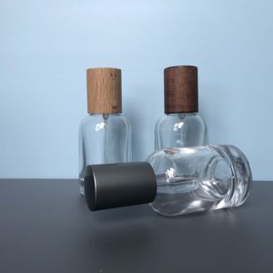 Botella de Perfume Premium de 30 ml, Botella de Vidrio Redonda con Pulverizador, Tapa de Madera y Metal, Dispensador de Cosméticos Portátil, Envase de Fragancia de Alta Gama - Product Image 2