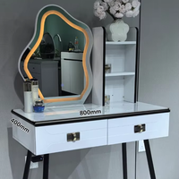 Meuble de rangement moderne et minimaliste en dalle de roche pour chambre à coucher, table de maquillage intégrée haut de gamme pour petit appartement avec miroir éclairé pour femmes