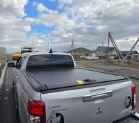 Couverture de lit de camionnette en aluminium à enroulement manuel électrique pour la protection du chargement