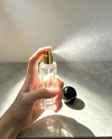Vente en gros de flacons de parfum vides en verre de 30 ml, flacon de parfum rectangulaire transparent avec bouchon sphérique noir pour Cologne