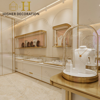 Vitrine d'exposition de bijoux en verre avec éclairage LED pour la décoration intérieure de bijouterie sur mesure, à vendre