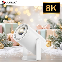 Projecteur Home Cinéma JUNUO TURN1 avec Android 14 OS, Écran Large de 235 Pouces, Projection à Courte Portée, Haut-parleurs Intégrés