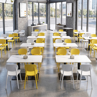 Table et chaises minimalistes pratiques, structure robuste, idéales pour les restaurants de restauration rapide, les cantines et les magasins d'alimentation
