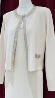 Ensemble deux pièces en tissu tricoté effet diamant, comprenant une veste à manches longues, une camisole et une jupe longue. Faible MOQ 2 pièces.