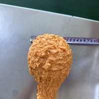 Jouet souple en forme de cuisse de poulet géante, très populaire, à récupération lente