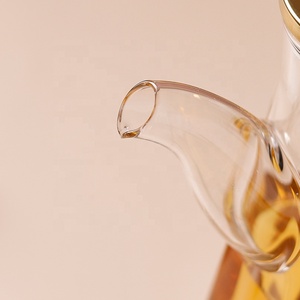 Bocal en verre borosilicaté transparent moderne de 500ml <span class=keywords><strong>Bouteille</strong></span> d'huile chauffée de 17 oz avec couvercle en métal pour emballage de cuisine - Product Image 3