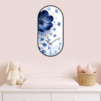 Horloge murale silencieuse elliptique bleue à fleurs, style luxe léger - Horloge murale décorative moderne à l'art floral