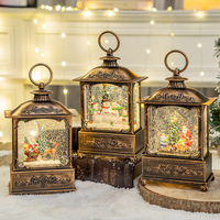 Décorations de Noël transfrontalières : Lanterne en plastique à thème Père Noël, boîte à musique, boule de cristal lumineuse, petits cadeaux de Noël pour les fêtes