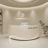 Comptoir de réception incurvé de luxe, comptoir moderne pour salon de beauté, spa, zone de réception