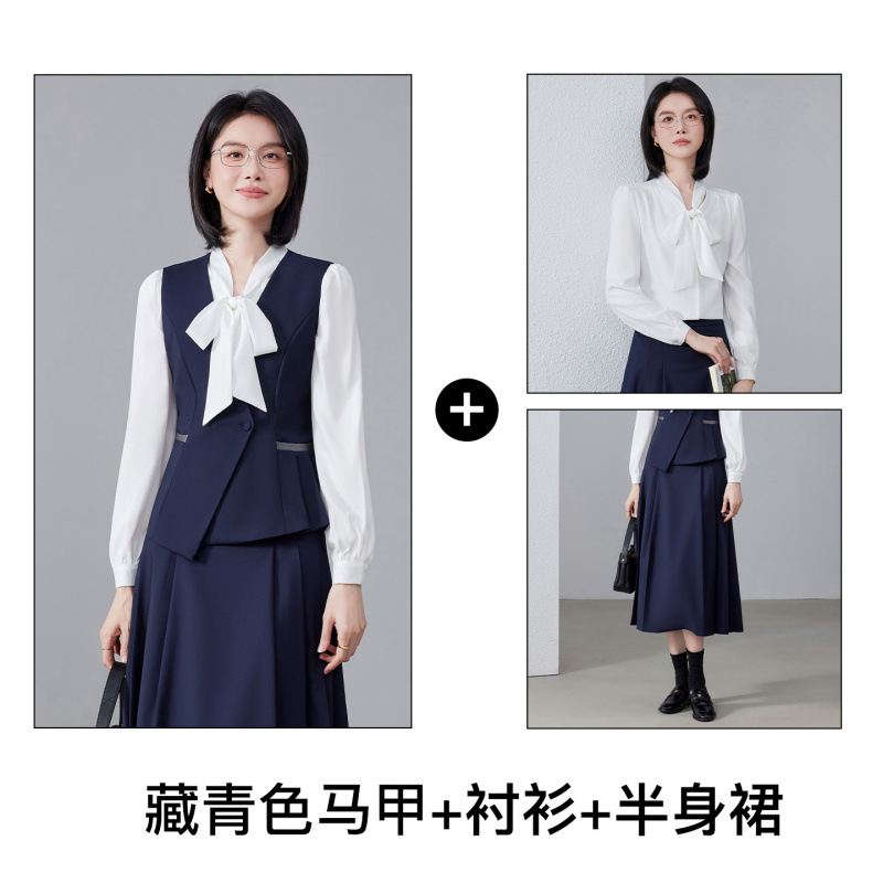 Navy blue vest, shirt, and skirt