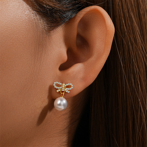 <b>CANNER</b> 925 Sterling Silver Imitation Pearl Knotted Stud Earrings Dainty 18K Gold Plated Bow Pearl Earrings Jewelry for Women - Product Image 5