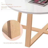 Table basse élégante à assemblage sans joint avec joint caché, table ronde en bois pour la décoration du salon