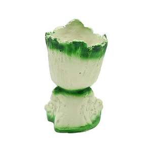 Figurine de personnage végétal en résine faite à la main, mignonne, avec des feuilles vertes et un design ludique, parfaite pour la décoration de la maison ou du bureau. - Product Image 2