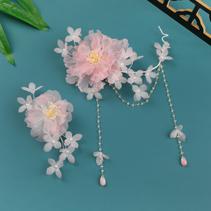 Nuevo Estilo Primavera 2026: Tocado Hanfu de Seda Rosa Claro Hecho a Mano con Borla y Flor Perforada, Accesorio para el Cabello - Product Image 4