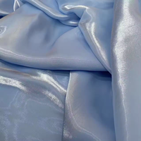 Tissu en gros 64gsm Satin brillant Liquide doux Soie cristalline Organza Chatoyant Tissu de mariée pour chemisiers/robes ou imprimé