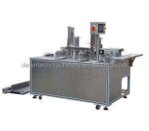 Machine d'emballage automatique de masques faciaux à grande vitesse en acier inoxydable pour usine de fabrication - Product Image 1