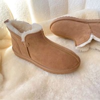Nouvelles bottes de neige unisexes à tige courte pour l'automne/hiver, dessus en cuir de vache, doublure en fourrure artificielle, semelle épaisse antidérapante en tendon