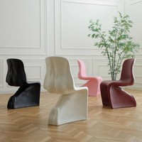 Chaise d'appoint sculpturale monobloc en plastique renforcé de fibres, design moderne, certifiée CE pour une utilisation intérieure et extérieure