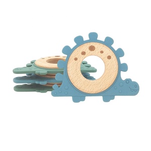 Anneau de dentition pour bébé en bois de hêtre de qualité alimentaire et silicone, hochet à main dinosaure, jouet de dentition pour nourrisson avec anneau en bois - Vente en gros - Product Image 1
