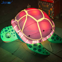 Tortue Marine Géante Gonflable Lumineuse Jenor – Modèle d'Animal Marin Gonflable Personnalisé pour Événements Extérieurs