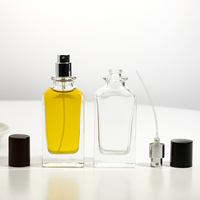 Flacon de parfum vide de 50 ml en verre transparent de forme rectangulaire avec pulvérisateur à pompe, impression de logo personnalisée