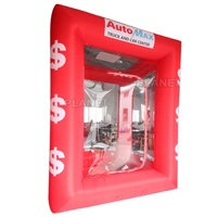 Arcade gonflable rouge de cabine d'argent de capture de vente chaude commerciale soufflant l'argent saisissant la machine à vendre