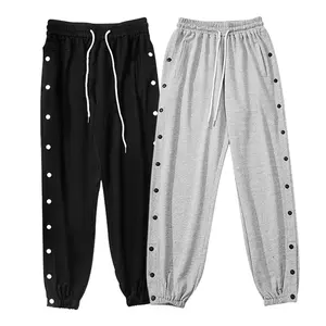 Venta al por mayor de los hombres Tear Away Baloncesto Entrenamiento Pantalones de calentamiento Athletic Joggers Side High Split Snap Button Pantalones de chándal