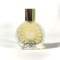 Bouteille en verre de parfum ronde en relief de haute qualité conception Unique pour huile essentielle et diffuseur 50ml emballage de boîte de Volume vide