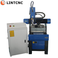 Madera de hierro fundido de escritorio de 4 ejes de alta precisión 3030 4040 6040 6060 6090 pequeño enrutador CNC precio de la máquina de molde de Metal