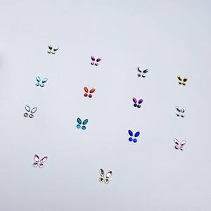 Strass dentaires tendance en forme de papillon avec un design 3D exquis, fabriqués en cristal brillant et <span class=keywords><strong>transparent</strong></span>, disponibles en plusieurs couleurs. - Product Image 5