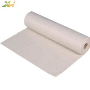 Rollo de tela no tejida personalizada transpirable de alta calidad 12-120GSM 100% PP/TNT Spunbond - Product Image 1