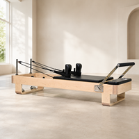 Machine de Pilates professionnelle en bois d'érable canadien, équipement de Pilates en bois d'érable, couleur et logo personnalisés en cuir pour les distributeurs mondiaux