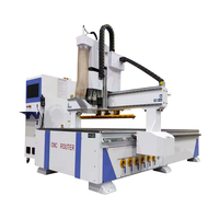 Machine de travail du bois CNC 1325, routeur CNC à trois axes, changeur d'outils automatique avec table à vide