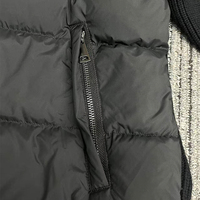 Veste matelassée à manches tricotées noire personnalisée pour hommes, manteau en duvet d'usine tricoté pour femmes