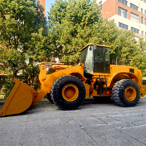 Chargeuse sur pneus CAT 966H d'occasion, puissance stable, idéale pour les projets de manutention de gravier et de roches. - Product Image 1