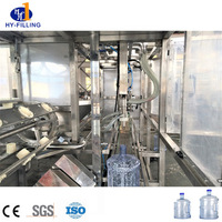 Machine de bouchage et de lavage de bouteilles d'eau automatique 3 en 1 Ligne de production de machine de remplissage de baril de 3 gallons 5 gallons