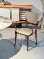 Chaise de restaurant haut de gamme en bois de frêne massif à grain ouvert, sculptée avec des courbes organiques, de précision CNC à 5 axes, rembourrée