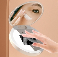 La protection faciale de peau de crème solaire détectent le miroir mené de maquillage enlevant le miroir UV de caméra