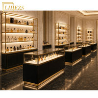 Rak Display Logam Toko Parfum Mewah Pesanan Khusus, Lemari Display Kaca Parfum dengan Lampu